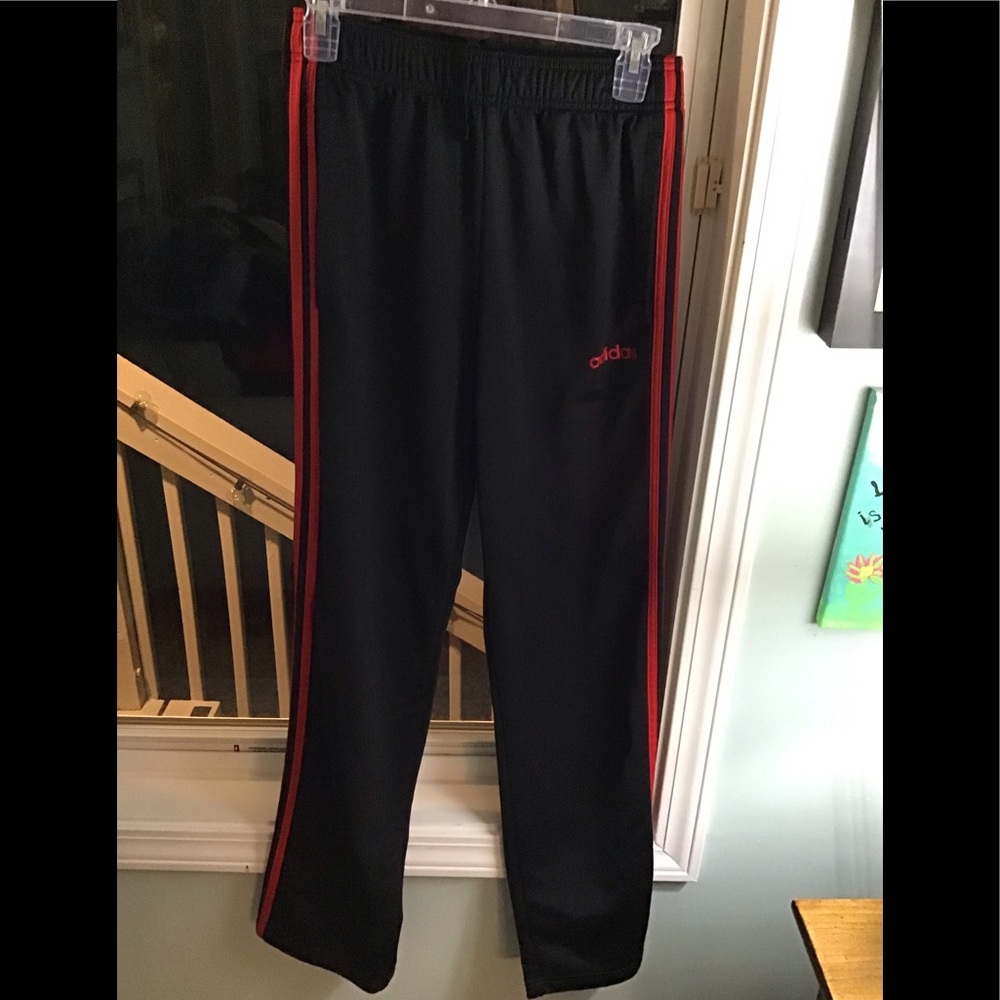 Adidas black warm up pants with red stripes down the side size S